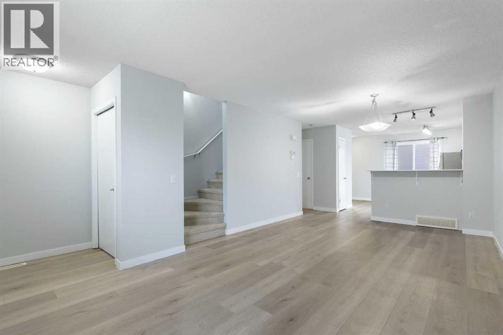 177 Tuscany Court Nw, Calgary, Alberta  T3L 2Y7 - Photo 6 - A2262880