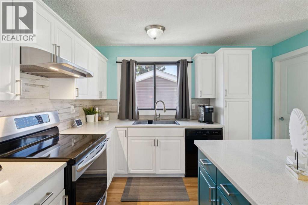 14 Glenhill Crescent, Cochrane, Alberta  T4C 1G8 - Photo 6 - A2264793