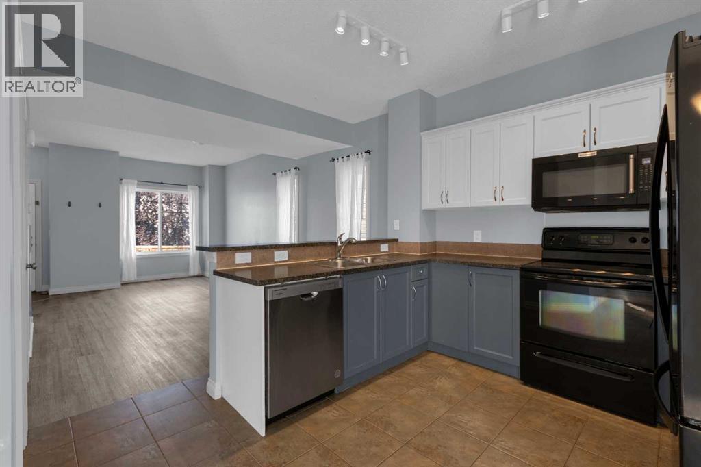 211 Strathaven Mews, Strathmore, Alberta  T1P 1P4 - Photo 7 - A2248839