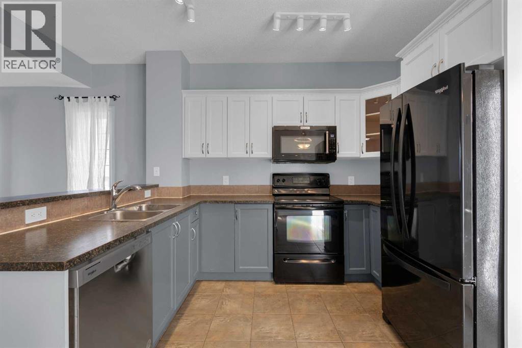 211 Strathaven Mews, Strathmore, Alberta  T1P 1P4 - Photo 8 - A2248839