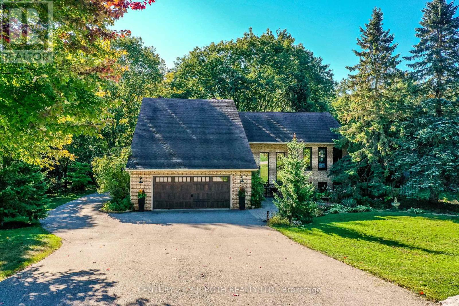39 Jodies Lane, Springwater, Ontario  L9X 0M4 - Photo 1 - S12464796