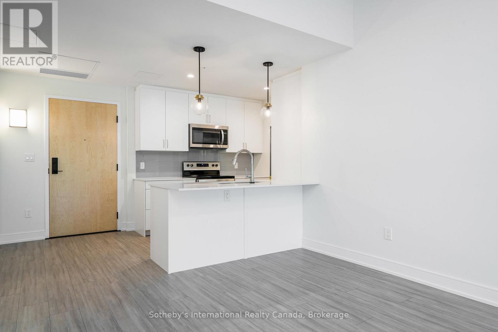 322 - 121 Mary Street, Clearview, Ontario  L0M 1G0 - Photo 2 - S12465069