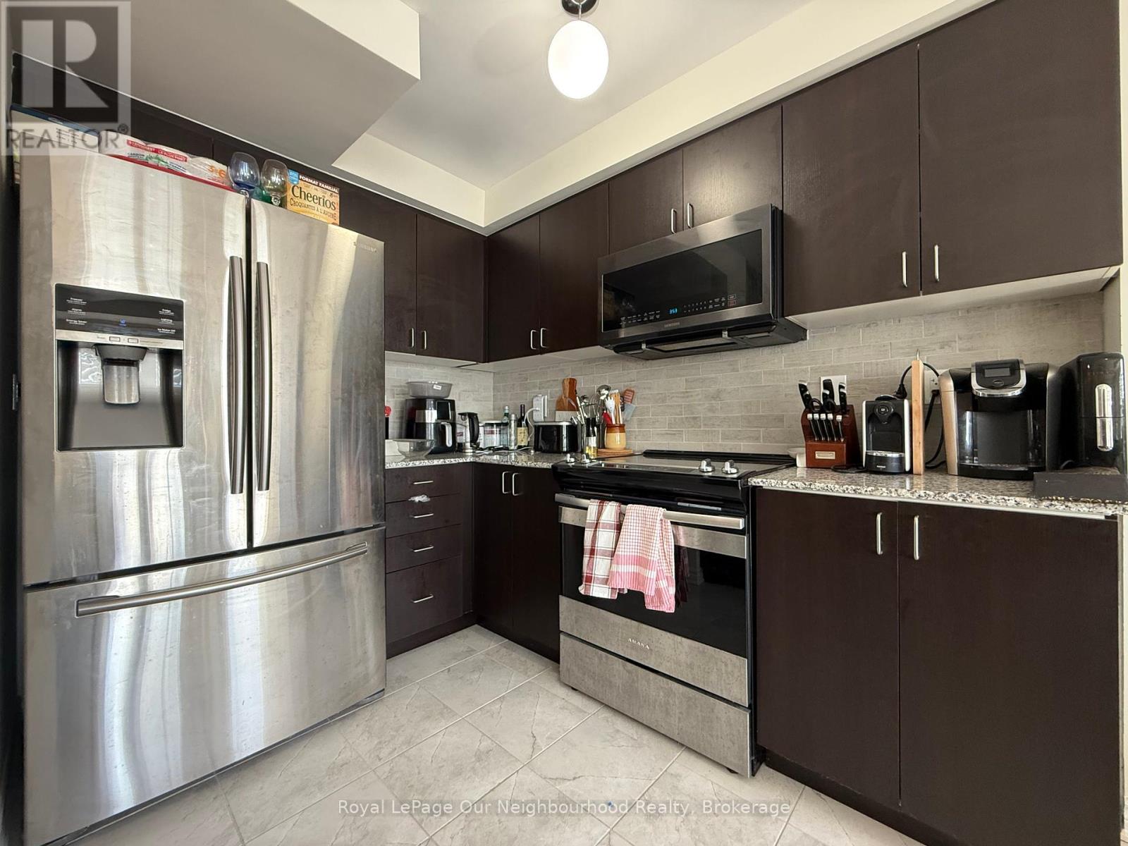 107 - 200 Veterans Drive, Brampton, Ontario  L7A 5K7 - Photo 1 - W12465475
