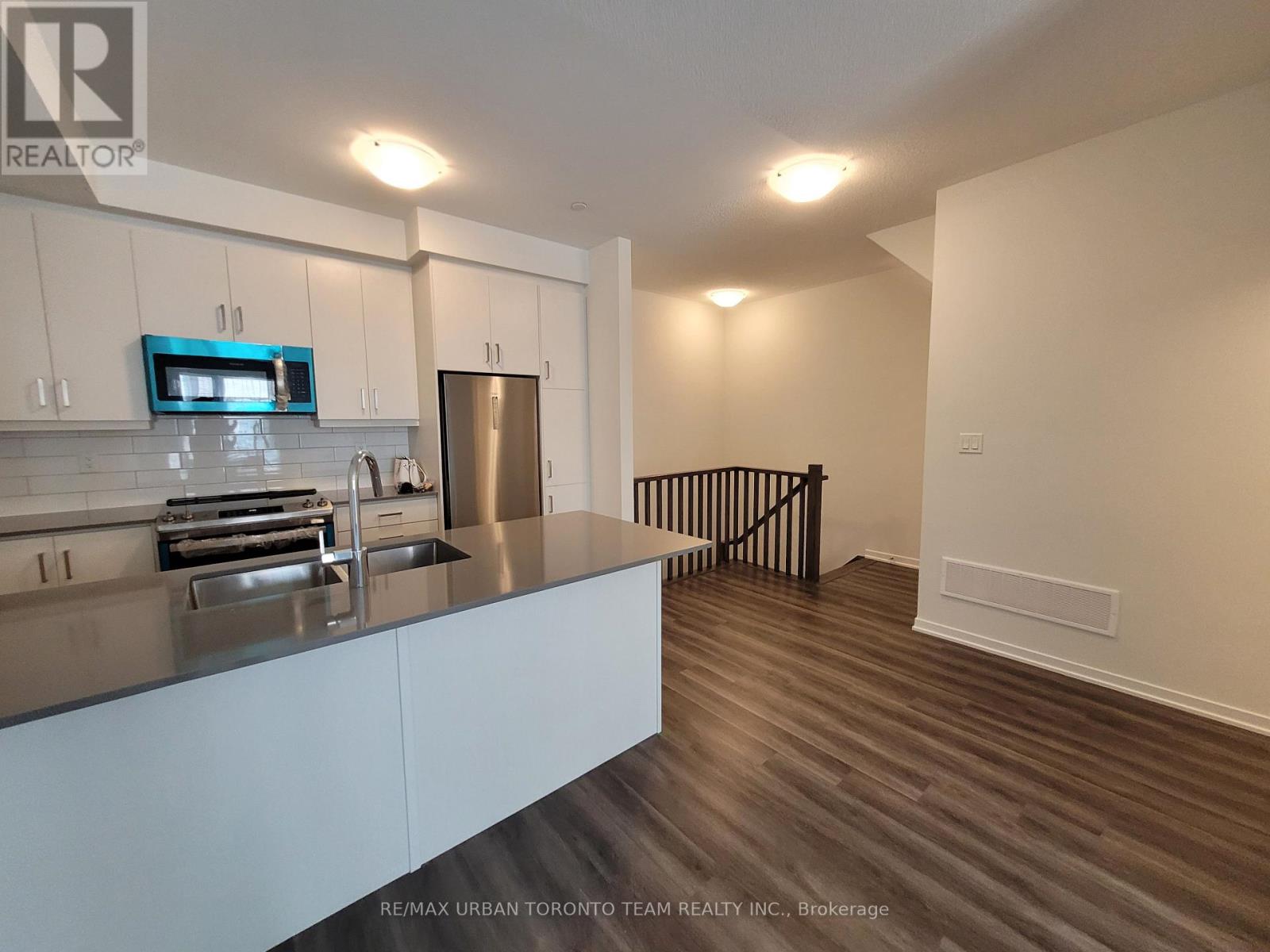 Th 165 - 151 Honeycrisp Crescent, Vaughan, Ontario  L4K 0N7 - Photo 6 - N12465336