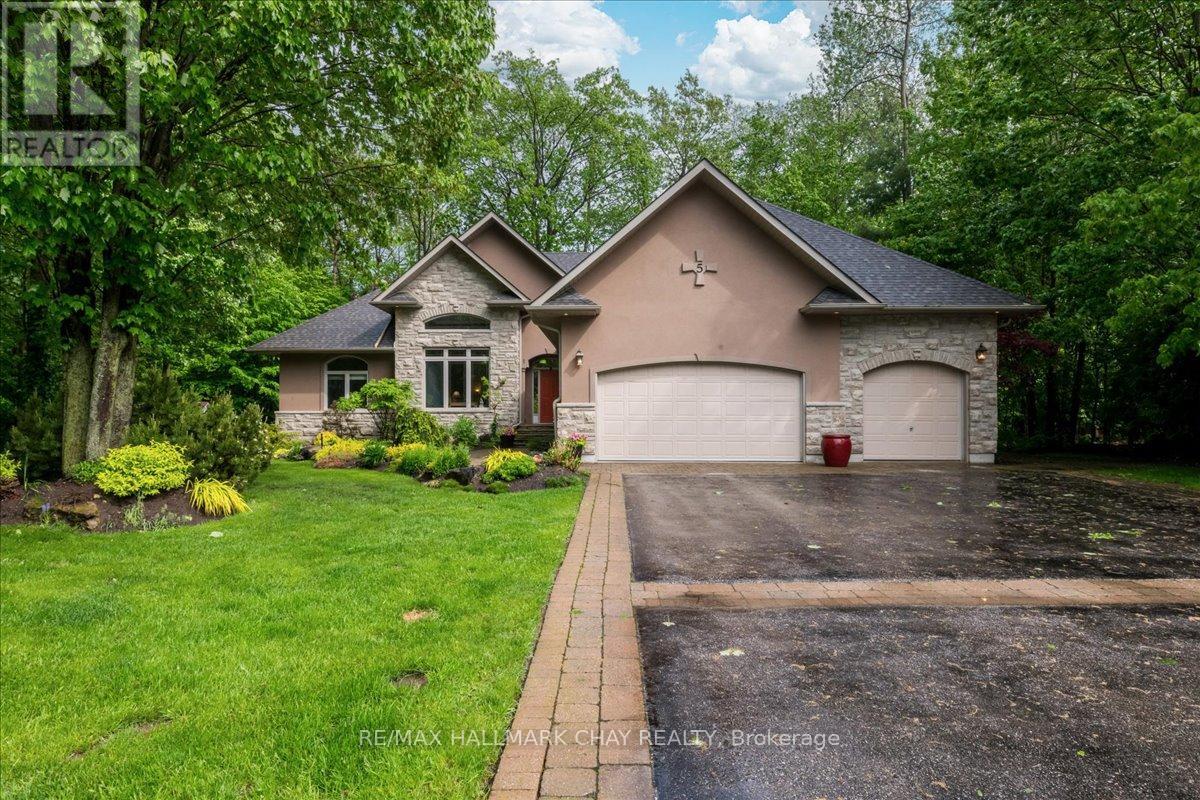 5 Timber Court, Springwater, Ontario  L9X 0H7 - Photo 1 - S12465424