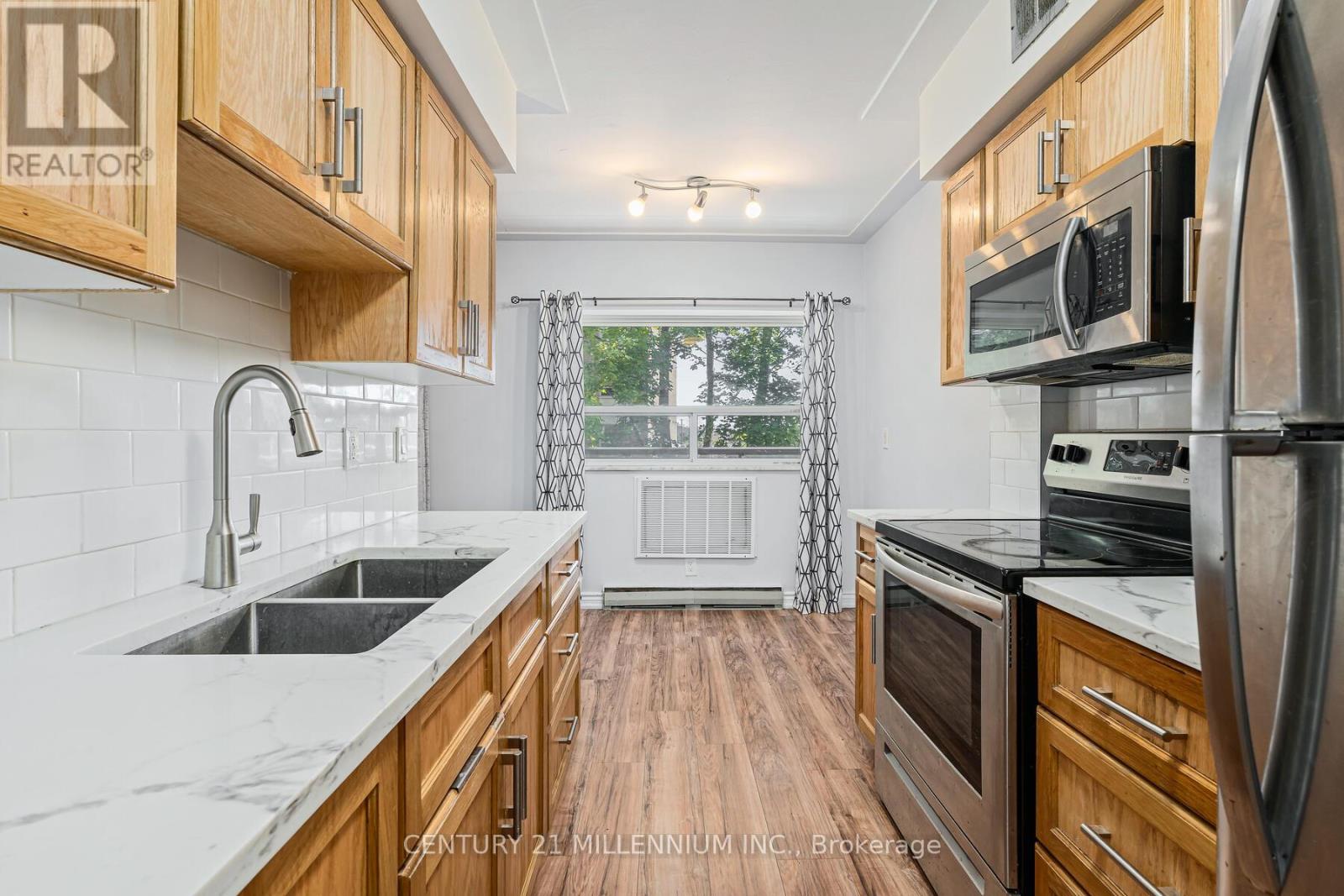 203 - 11 Woodman Drive, Hamilton, Ontario  L8K 4E3 - Photo 14 - X12465571