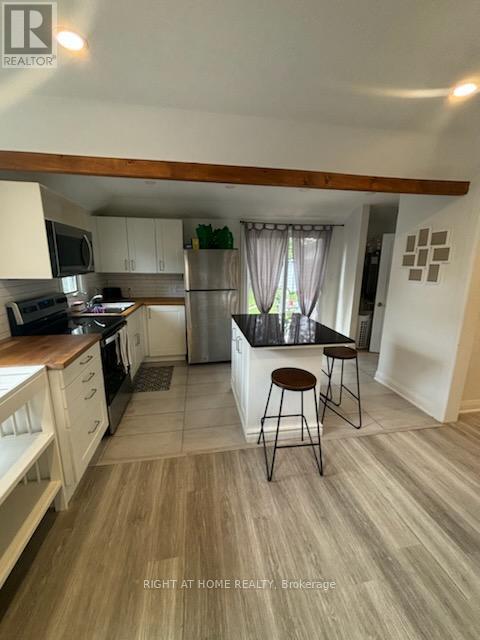 895 Maplewood Drive, Innisfil, Ontario  L9S 1Y7 - Photo 4 - N12465780