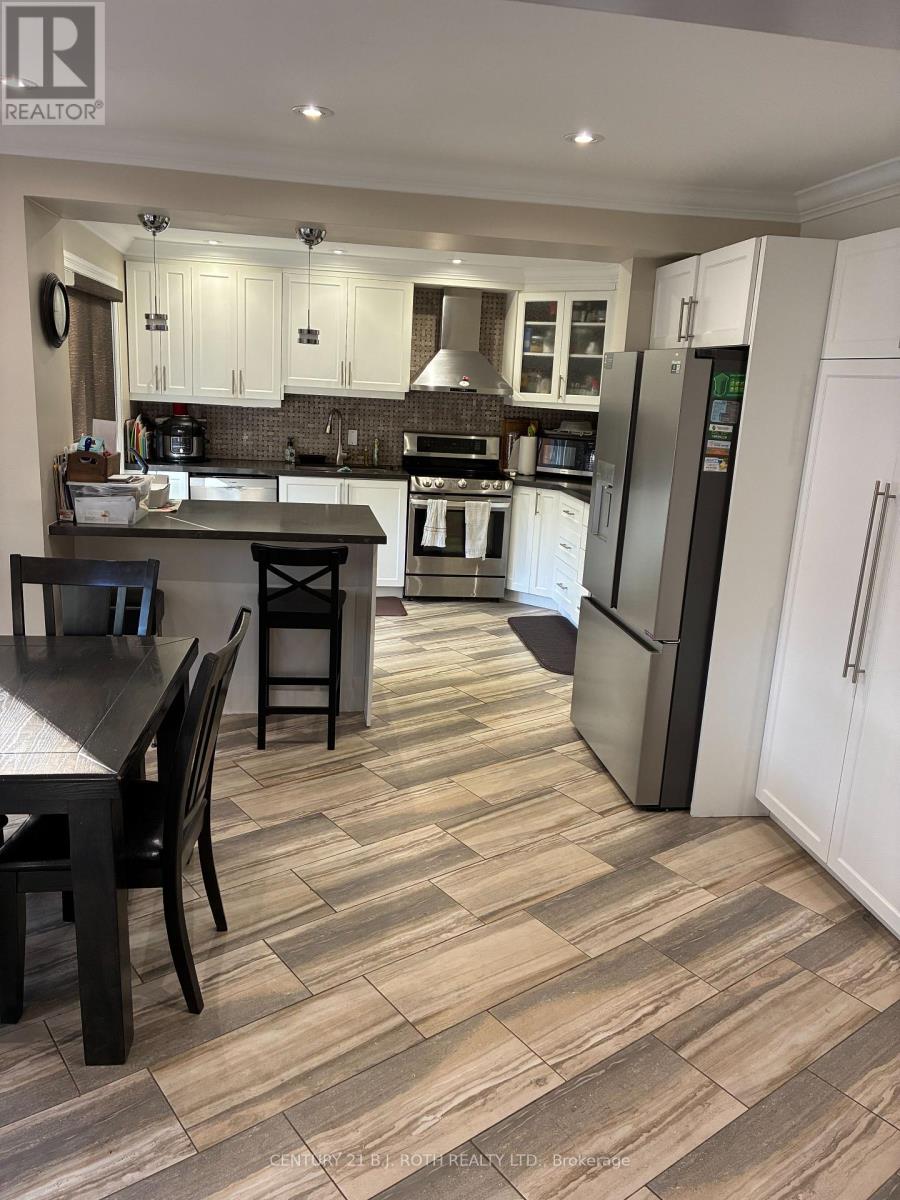 52 Carruthers Crescent, Barrie, Ontario  L4M 6A6 - Photo 4 - S12465852
