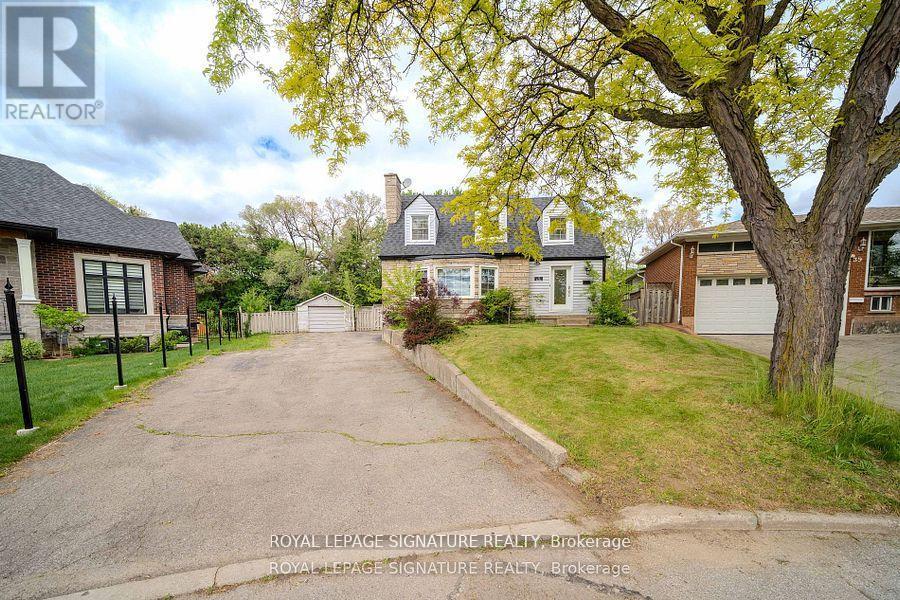 41 Mayo Drive, Toronto, Ontario  M6L 2X4 - Photo 2 - W12465834
