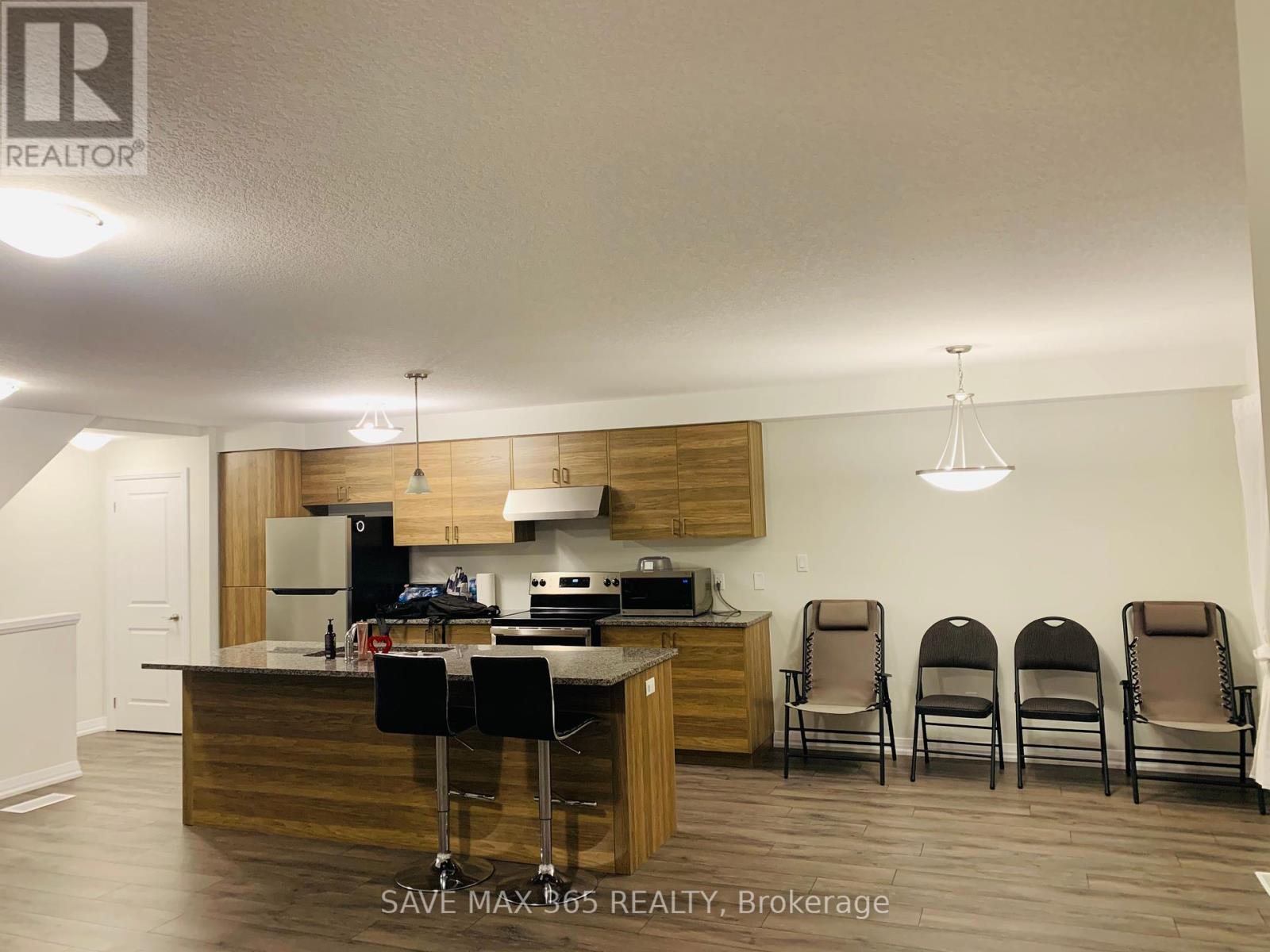 3 Bank Swallow Crescent, Kitchener, Ontario  N2P 0J7 - Photo 4 - X12465820