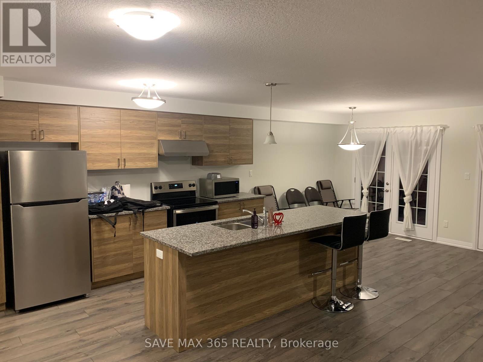 3 Bank Swallow Crescent, Kitchener, Ontario  N2P 0J7 - Photo 5 - X12465820