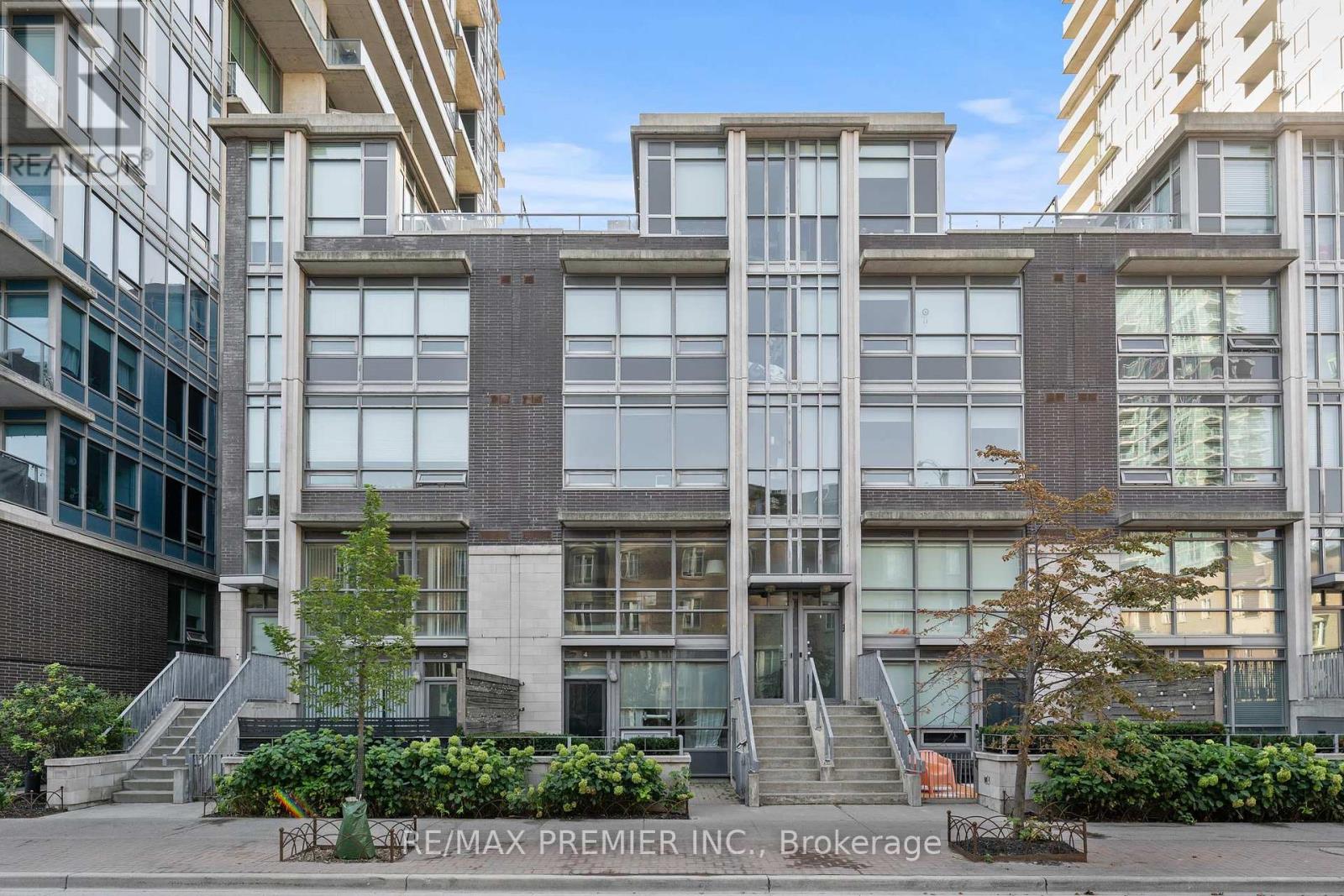 Experience the best of Liberty Village with this rare 3-bedroom, 2-bath townhouse offering 1,140 sq. ft. of stylish living space plus a sun-soaked 160 sq. ft. rooftop terrace. Featuring polished concrete floors, a chef's kitchen with full-size stainless steel appliances, quartz countertops, an oversized island, and a sleek slide-out pantry, this home blends modern design with everyday convenience. The private rooftop terrace includes a gas BBQ hookup and a water hose connection, making it perfect for entertaining, gardening, or simply relaxing in the sun. Enjoy the comfort of 1 underground parking space and a locker, plus access to an unbeatable lineup of condo amenities-from a party room with catering kitchen, private lounge and BBQ area, to a multimedia lounge, billiards and games rooms, and a full Aqua Spa with pool, whirlpool, and indoor/outdoor decks. Stay active with state-of-the-art fitness facilities, unwind in the library, host visiting guests in the suites, and take advantage of 24-hour concierge, car wash bay, ample visitor parking, and onsite management. With townhouse living and resort-style perks, this is Liberty Village living at its finest. (id:48254)