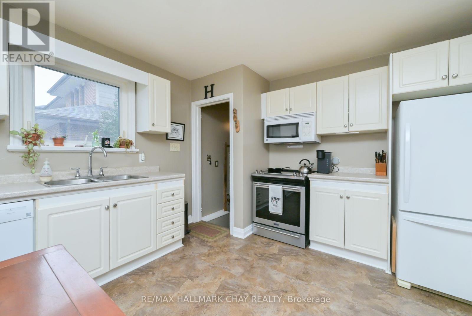 57 Nelson Street E, New Tecumseth (Alliston), Ontario  L0M 1A0 - Photo 7 - N12466161