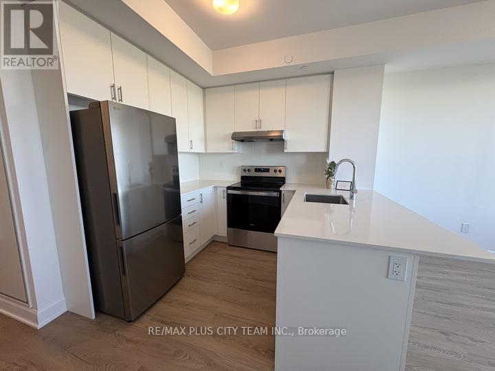 1305 - 3240 William Coltson Avenue, Oakville, Ontario  L6H 8C8 - Photo 5 - W12466172