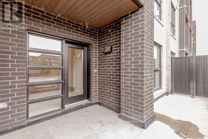 107 - 349 Wheat Boom Drive, Oakville, Ontario  L6H 7X5 - Photo 3 - W12466271