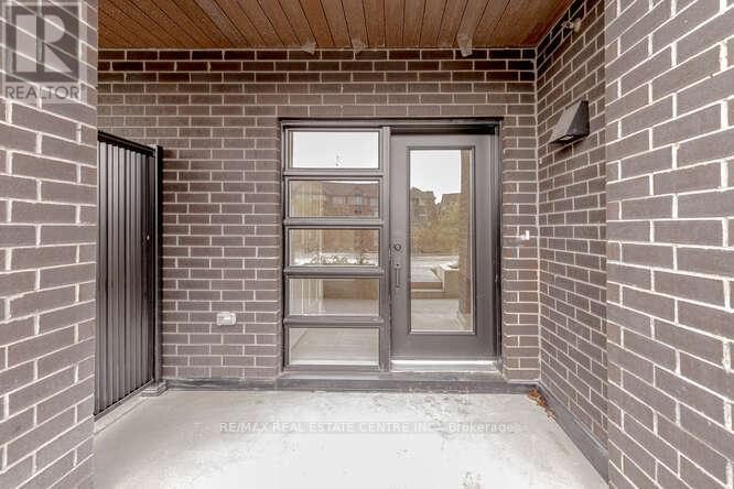 107 - 349 Wheat Boom Drive, Oakville, Ontario  L6H 7X5 - Photo 4 - W12466271