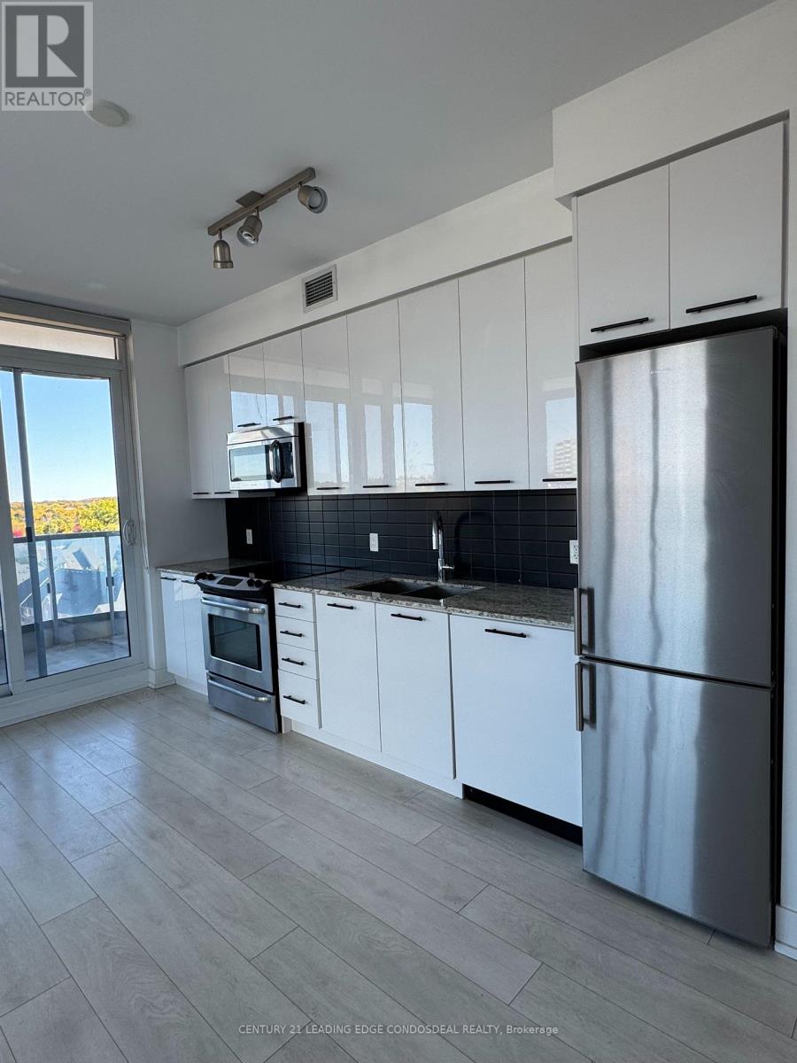 913 - 9471 Yonge Street, Richmond Hill, Ontario  L4C 0Z5 - Photo 2 - N12466155