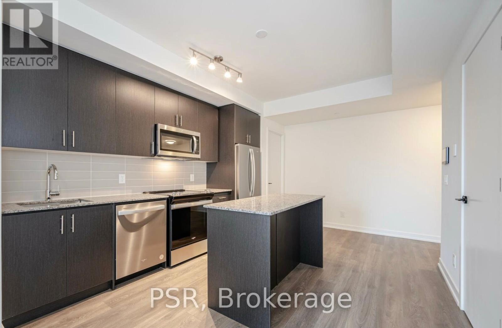 214 - 335 Wheat Boom Drive, Oakville, Ontario  L6H 7X4 - Photo 4 - W12466493