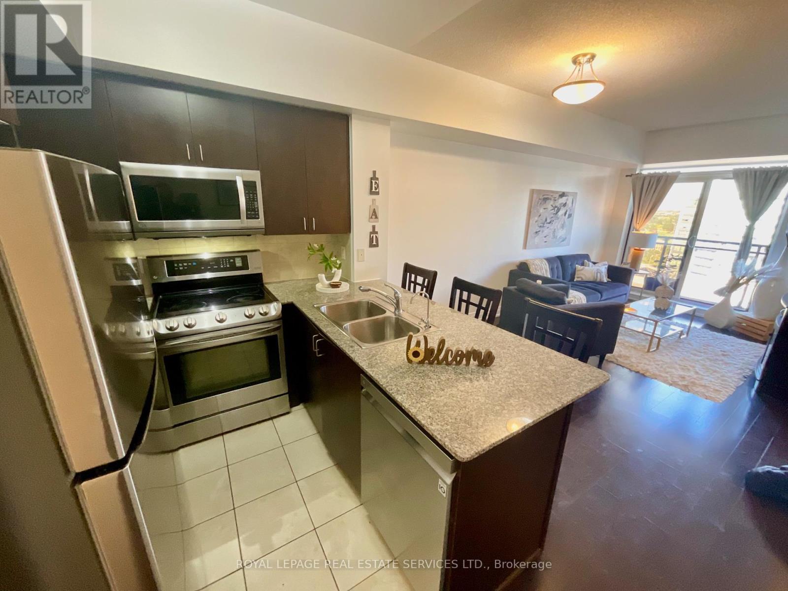 1203 - 55 De Boers Drive, Toronto, Ontario  M3J 0G5 - Photo 2 - W12462467