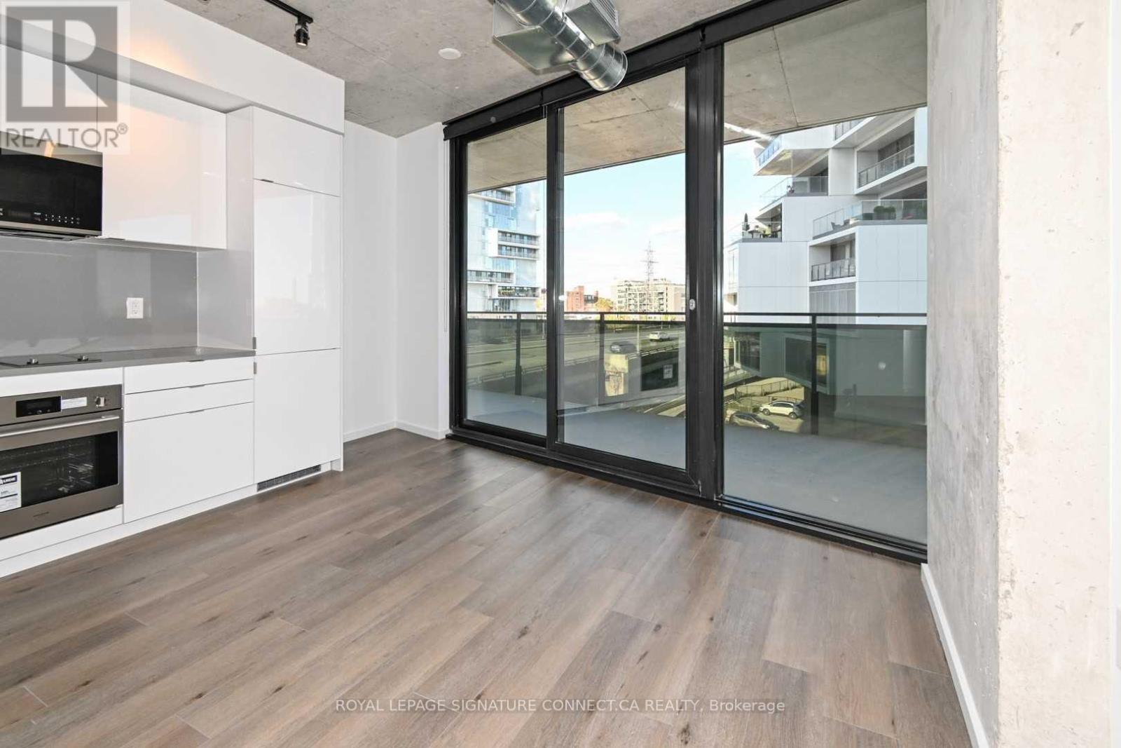 414 - 21 Lawren Harris Square, Toronto, Ontario  M5A 1H7 - Photo 1 - C12466663