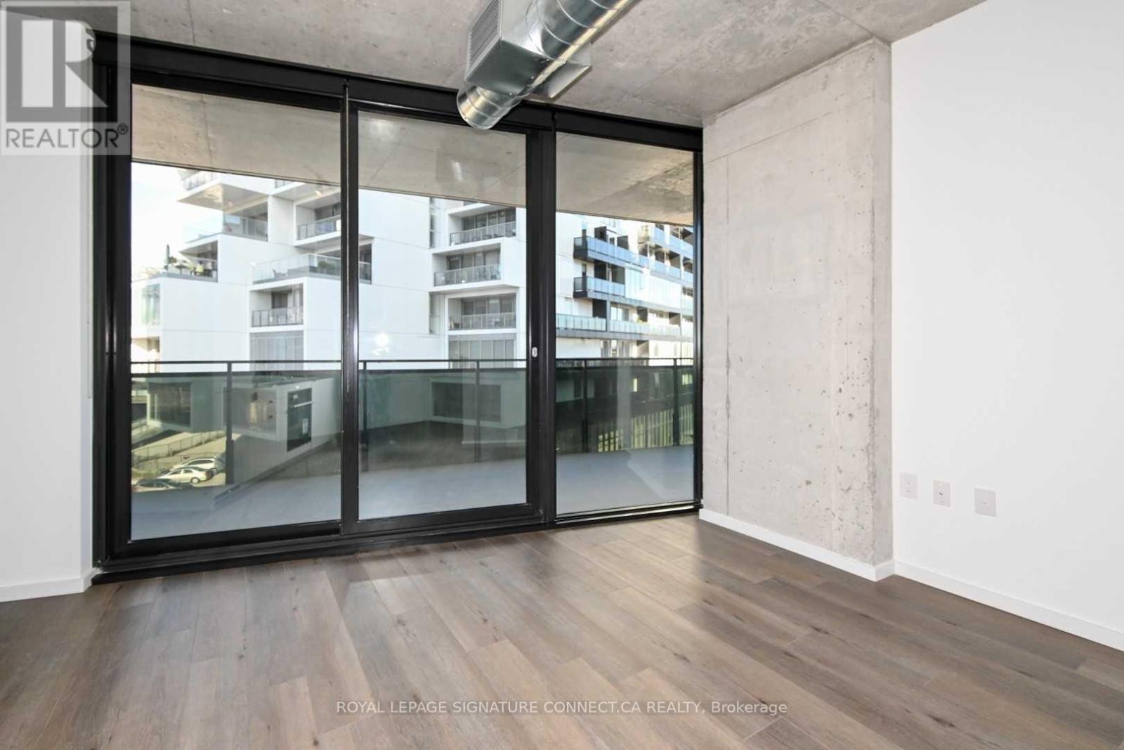 414 - 21 Lawren Harris Square, Toronto, Ontario  M5A 1H7 - Photo 2 - C12466663