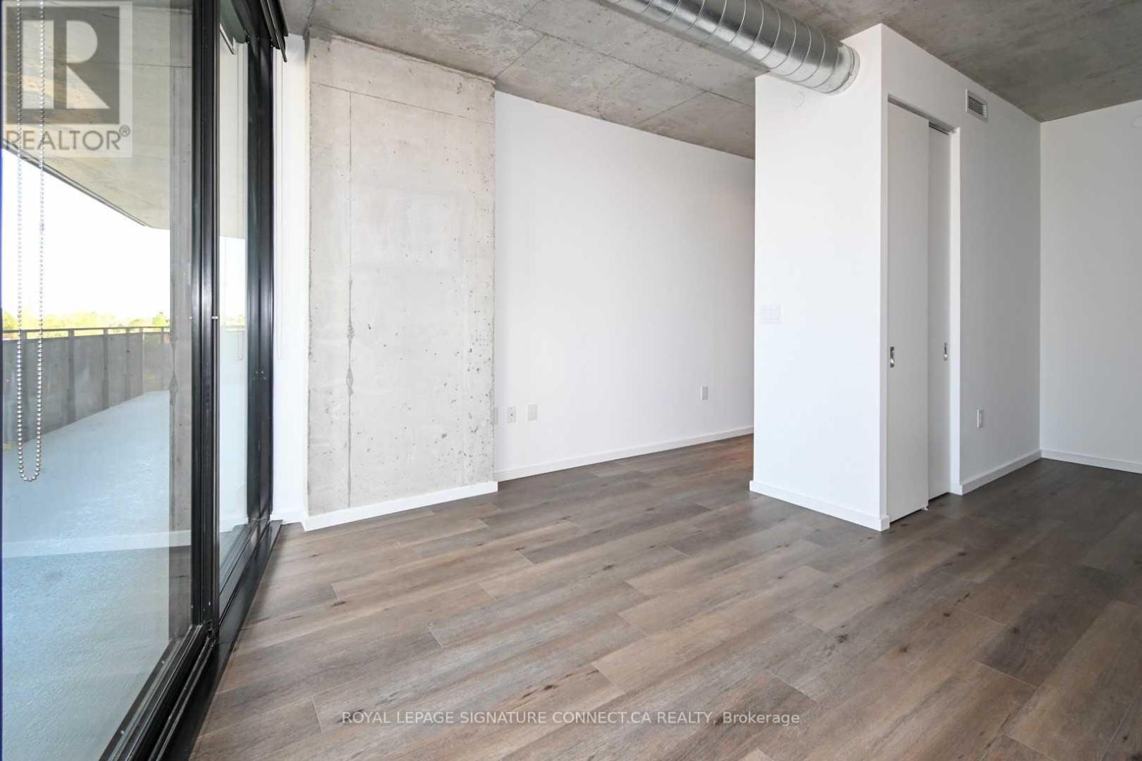 414 - 21 Lawren Harris Square, Toronto, Ontario  M5A 1H7 - Photo 3 - C12466663