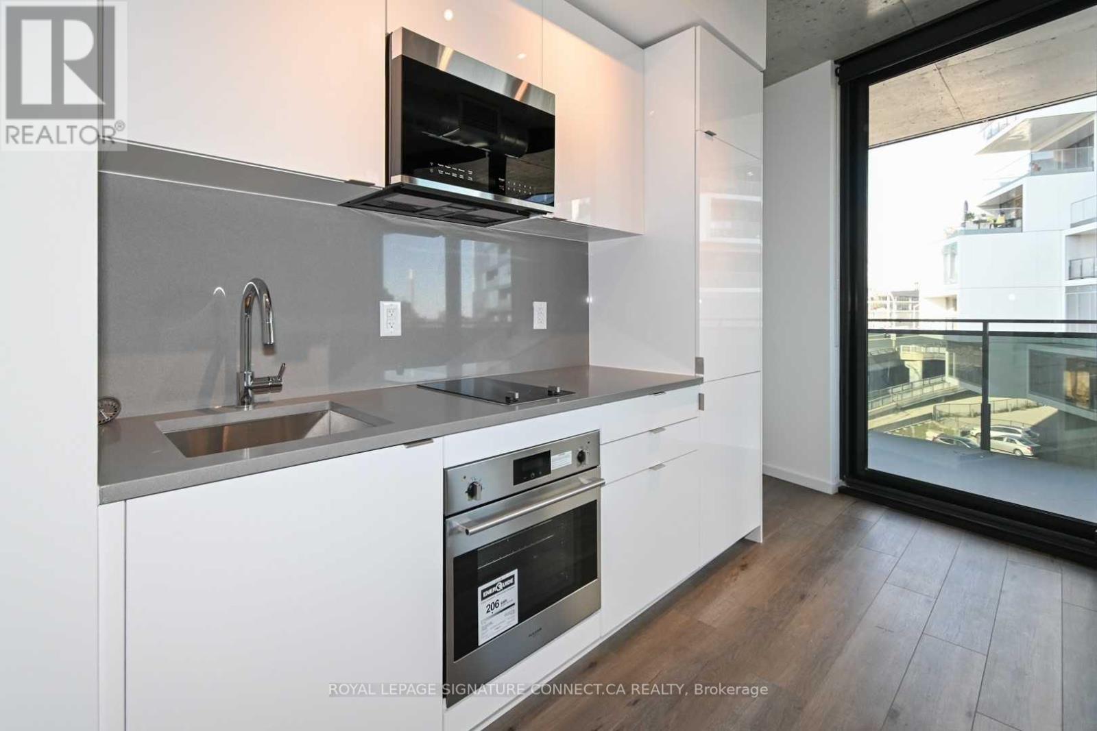 414 - 21 Lawren Harris Square, Toronto, Ontario  M5A 1H7 - Photo 4 - C12466663