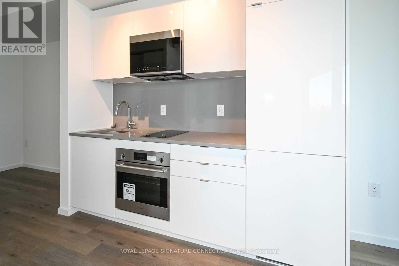 414 - 21 Lawren Harris Square, Toronto, Ontario  M5A 1H7 - Photo 6 - C12466663