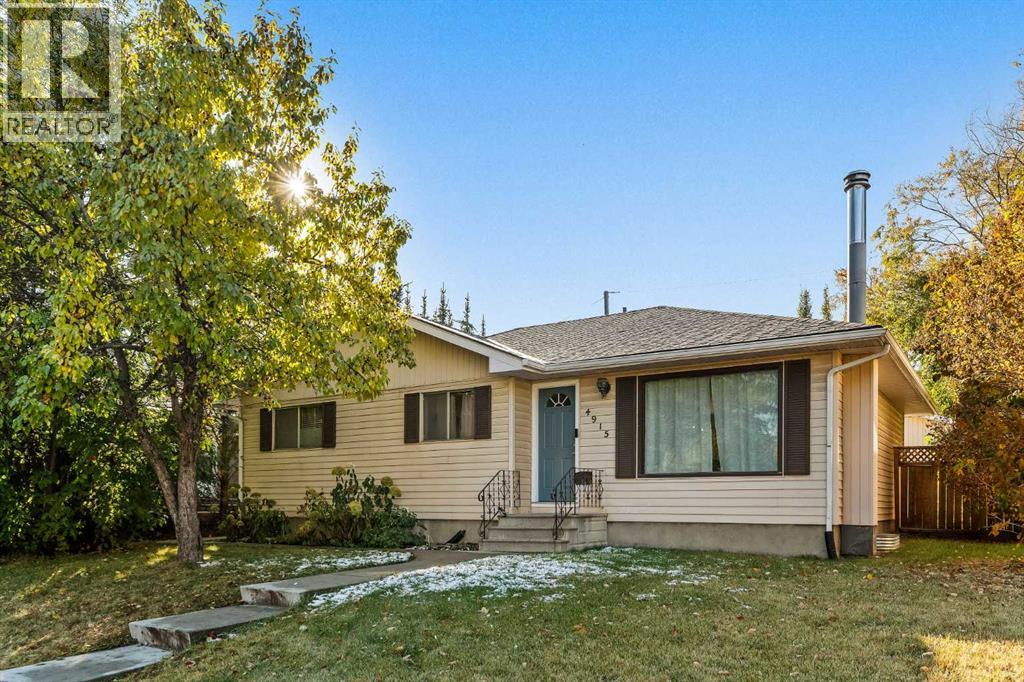 4915 43 Street Sw, Calgary, Alberta  T3E 3R2 - Photo 1 - A2264642