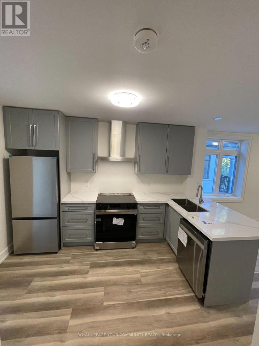 8 - 263 Barrie Street W, Bradford West Gwillimbury, Ontario  L3Z 1A2 - Photo 4 - N12428322