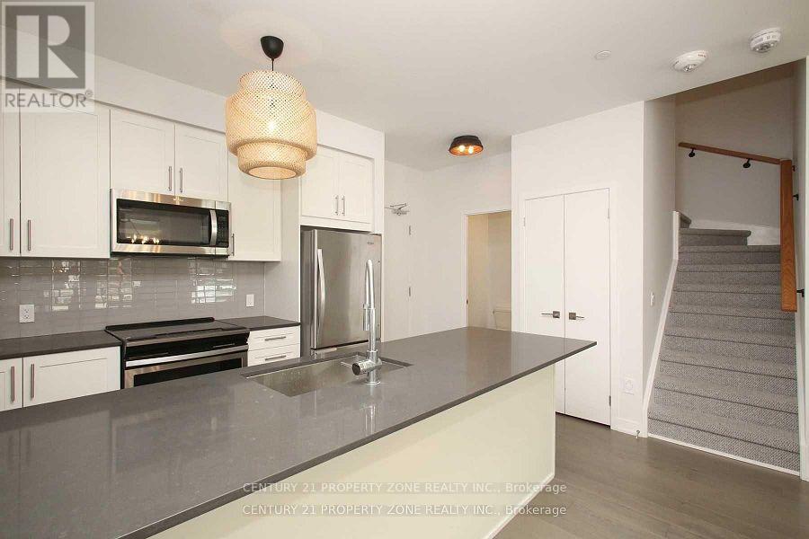 Th-17 - 4055 Parkside Village Drive, Mississauga, Ontario  L5B 0K8 - Photo 7 - W12466898