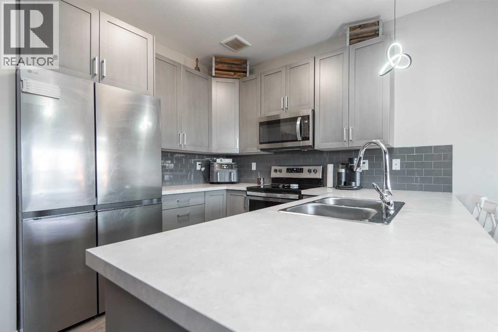 26 Hutton Place, Penhold, Alberta  T0M 1R0 - Photo 4 - A2264838
