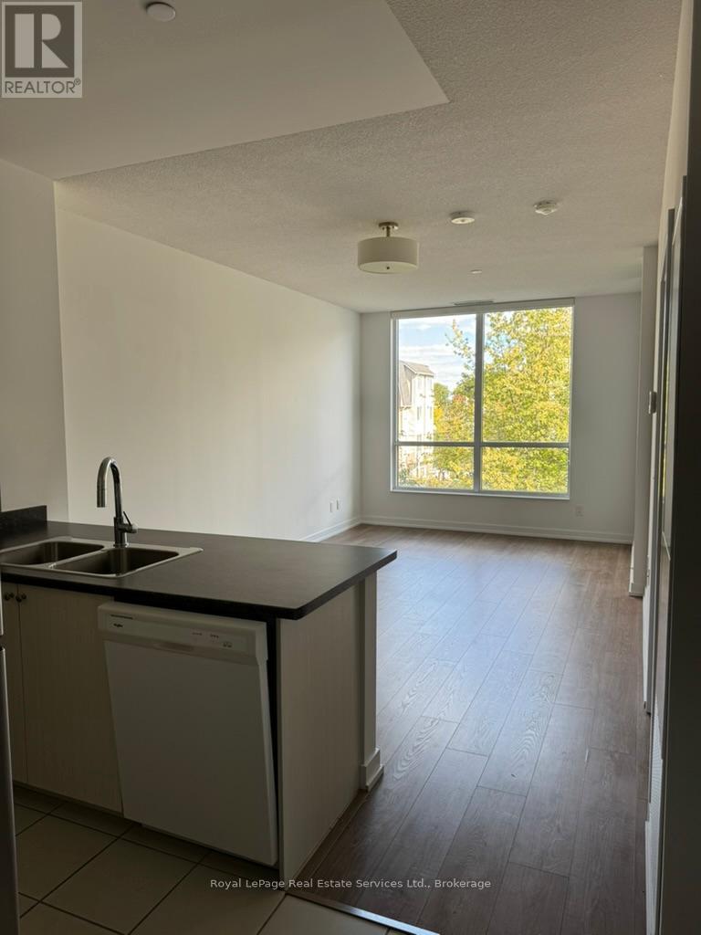 213 - 8 TRENT AVENUE, Toronto, Ontario