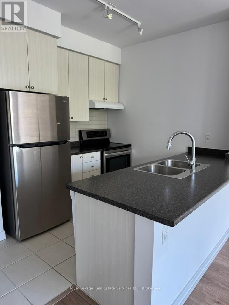 213 - 8 Trent Avenue, Toronto, Ontario  M4C 0A6 - Photo 4 - E12467297