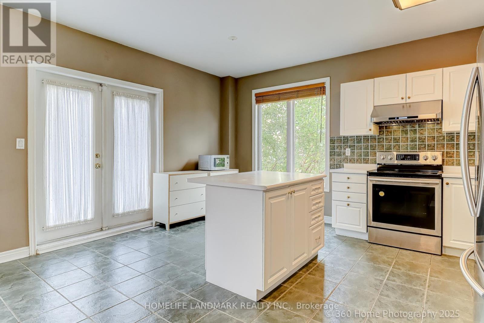 189 Leitchcroft Crescent, Markham, Ontario  L3T 7T5 - Photo 6 - N12467306