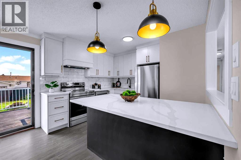 951 Maitland Way Ne, Calgary, Alberta  T2A 5M8 - Photo 6 - A2263789