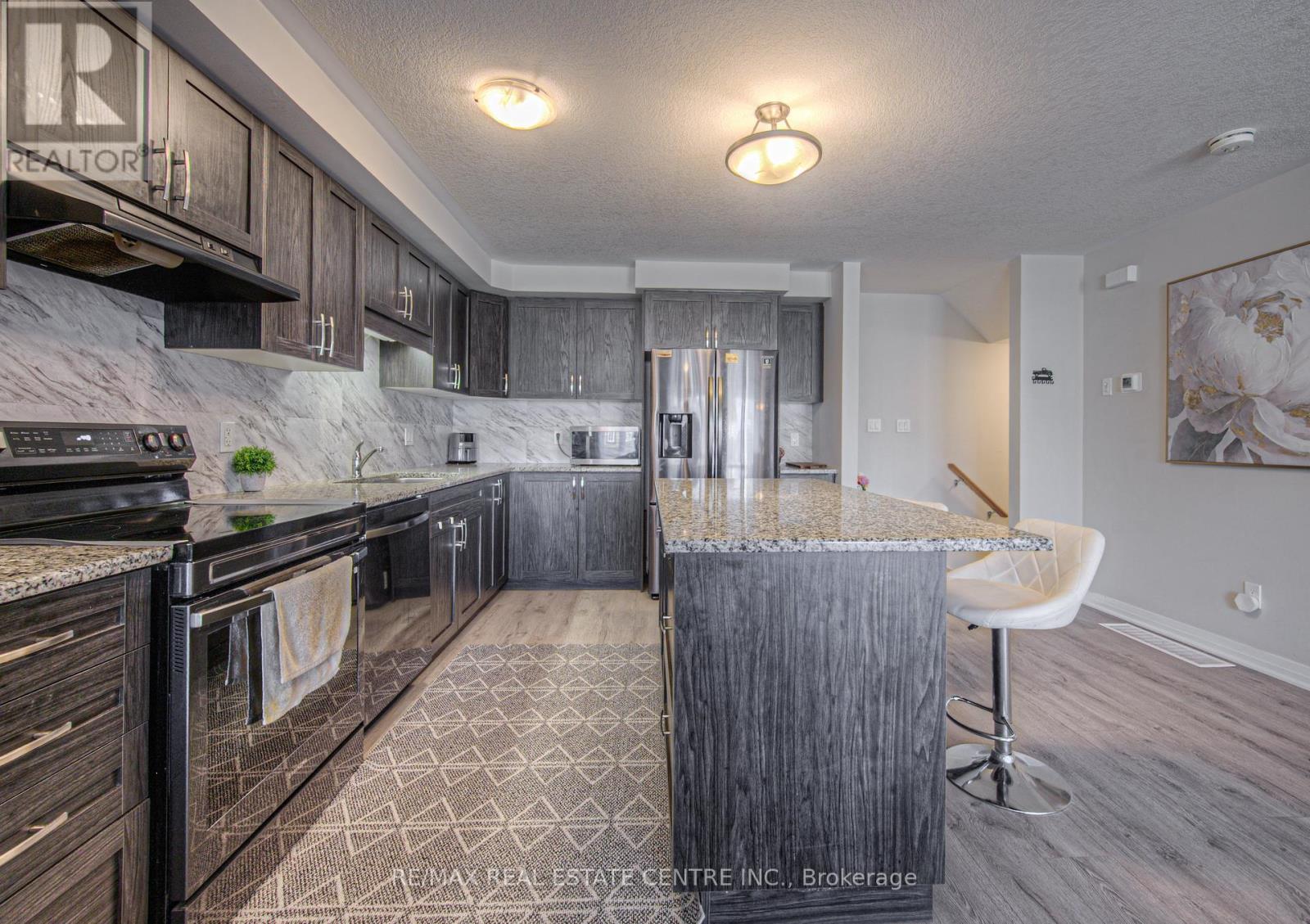 119 - 23 Valencia Avenue E, Kitchener, Ontario  N2R 0R7 - Photo 11 - X12467330