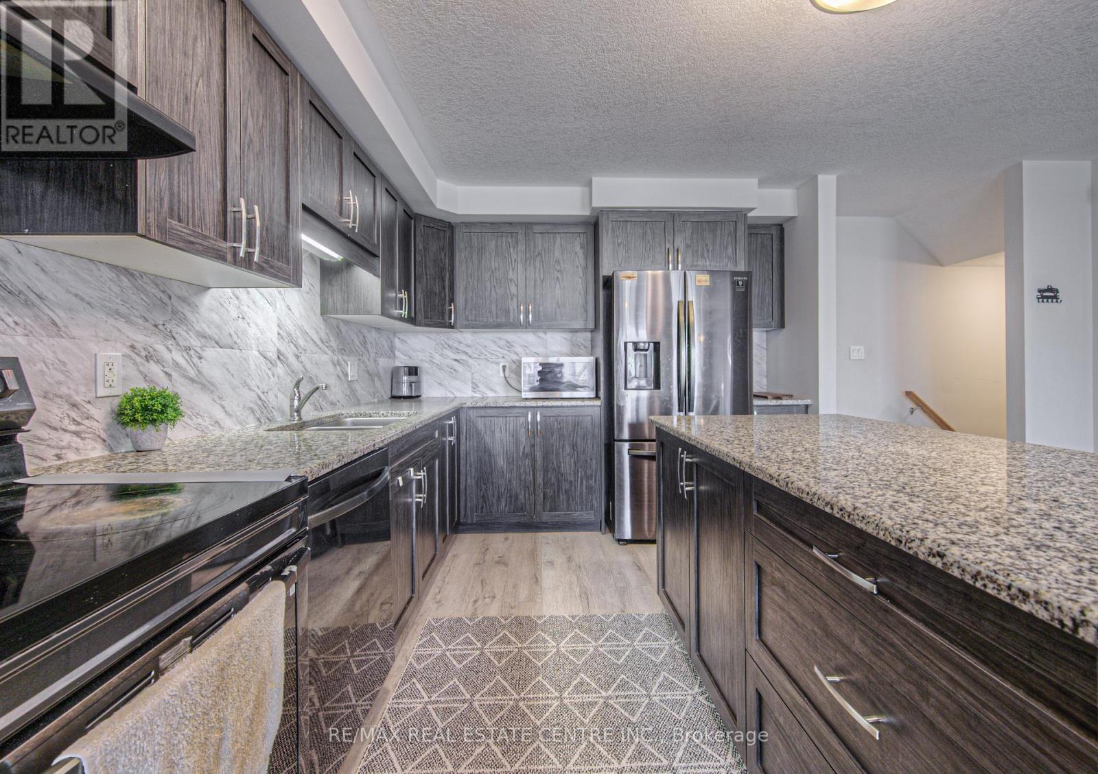 119 - 23 Valencia Avenue E, Kitchener, Ontario  N2R 0R7 - Photo 12 - X12467330