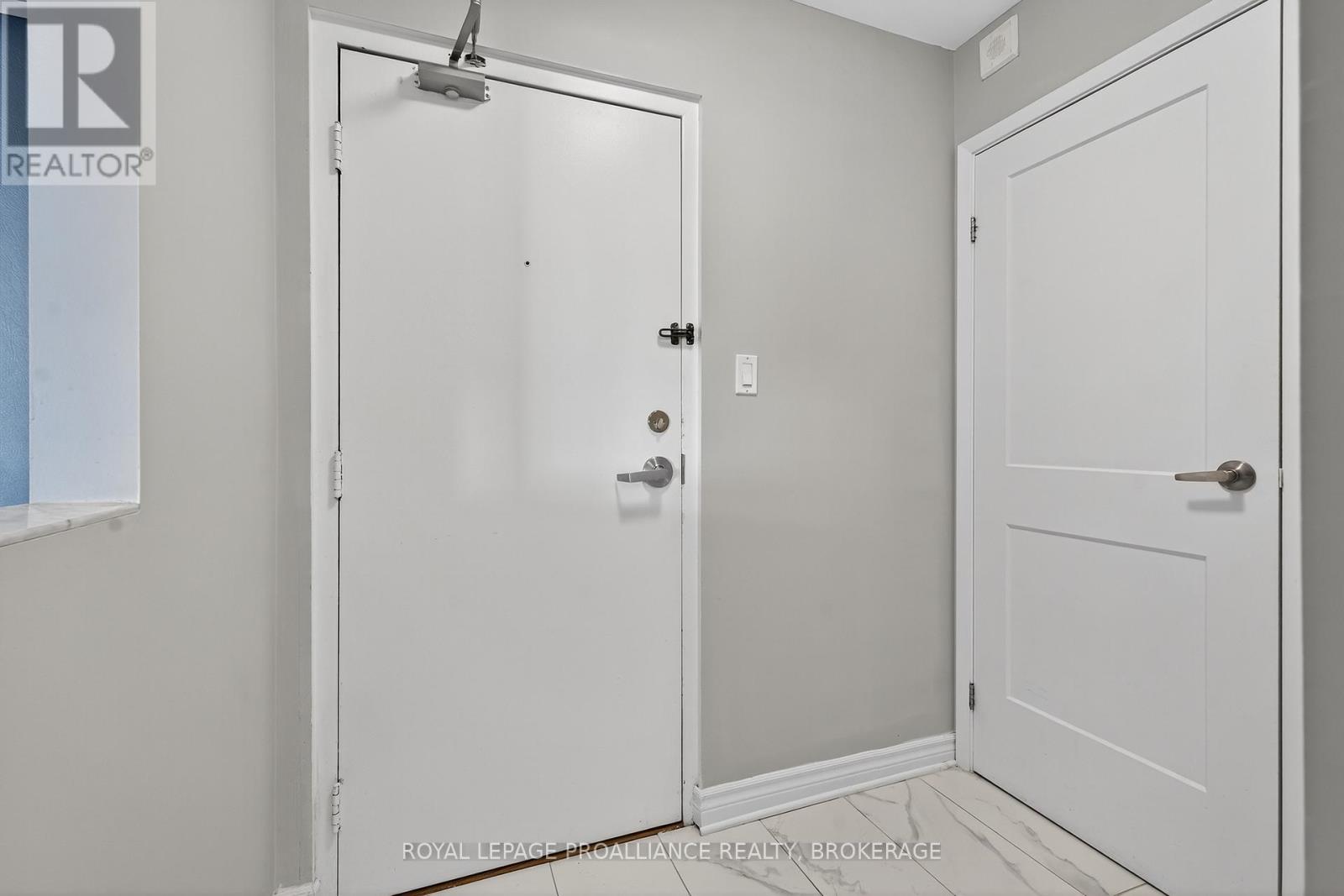 701 - 165 Ontario Street, Kingston, Ontario  K7L 2Y6 - Photo 2 - X12467683