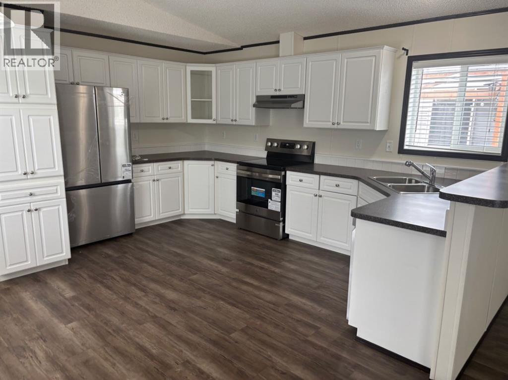 202, 1101 84 Street Ne, Calgary, Alberta  T2A 7X2 - Photo 20 - A2248644