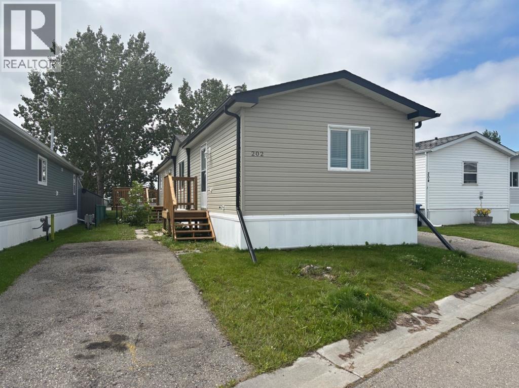 202, 1101 84 Street Ne, Calgary, Alberta  T2A 7X2 - Photo 2 - A2248644