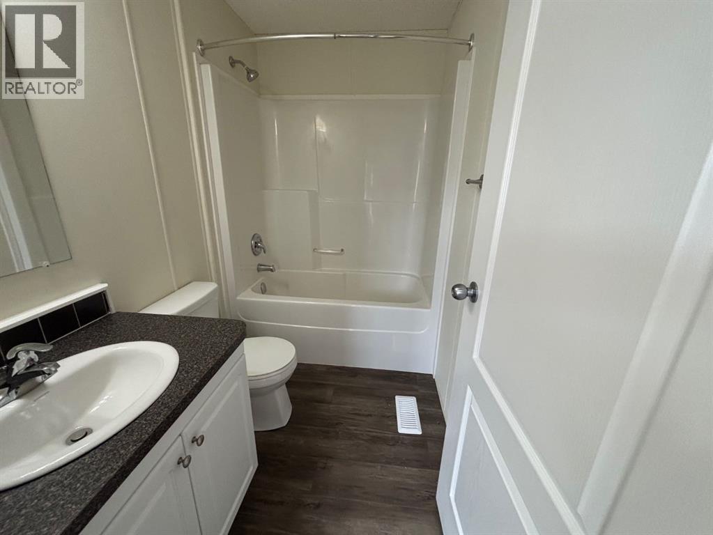 202, 1101 84 Street Ne, Calgary, Alberta  T2A 7X2 - Photo 7 - A2248644