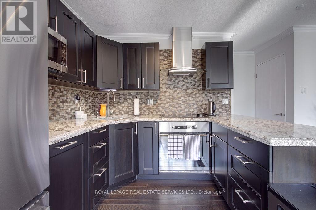 410 - 1110 Walden Circle, Mississauga, Ontario  L5J 4R3 - Photo 12 - W12467846