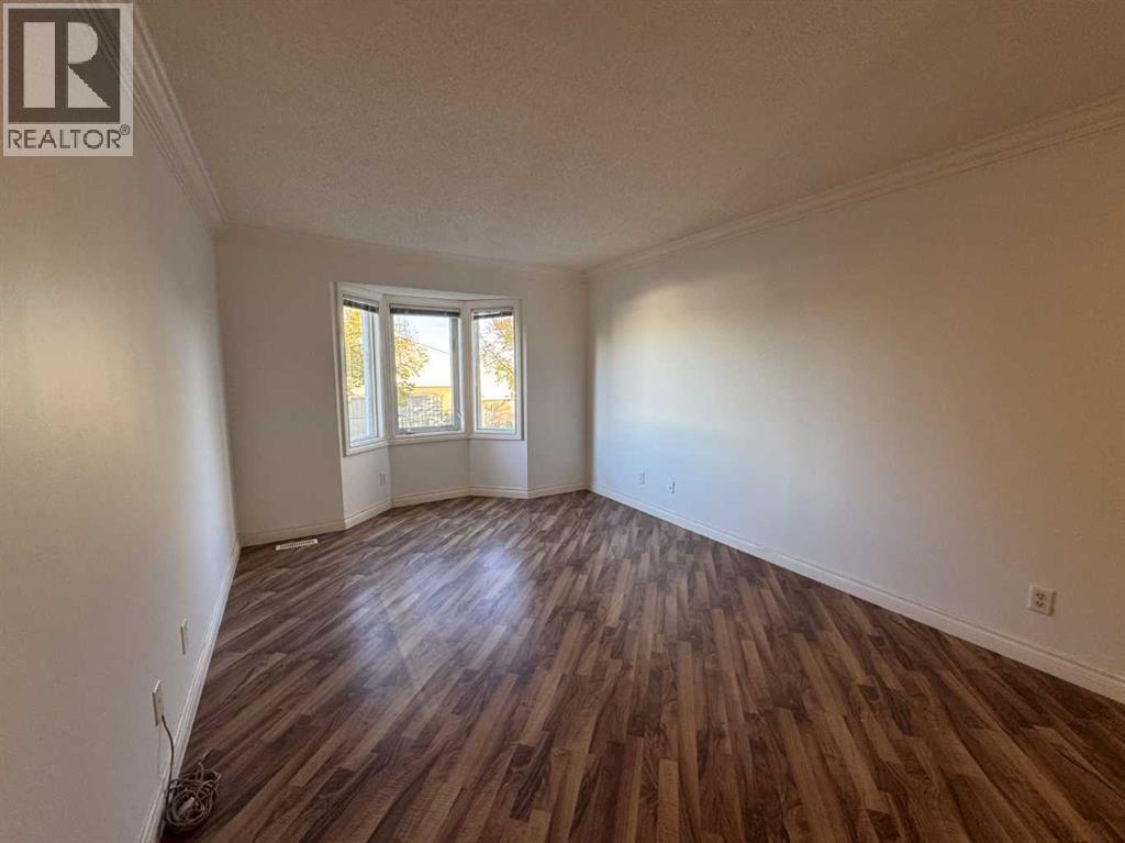 143 Cedarwood Lane Sw, Calgary, Alberta  T2W 6J3 - Photo 4 - A2245791