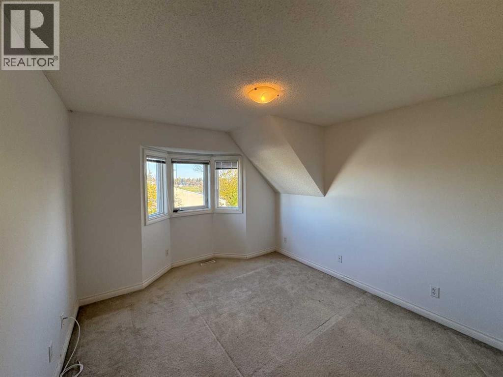 143 Cedarwood Lane Sw, Calgary, Alberta  T2W 6J3 - Photo 8 - A2245791