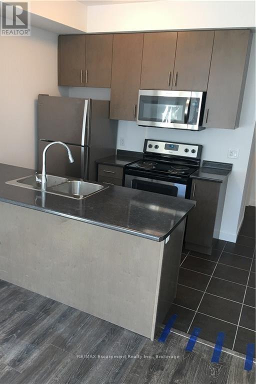 713 - 2486 Old Bronte Road, Oakville, Ontario  L6M 4J2 - Photo 4 - W12468349