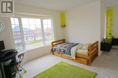 2 Abbotsbury Drive, Brampton, Ontario  L6X 0S3 - Photo 4 - W12284223