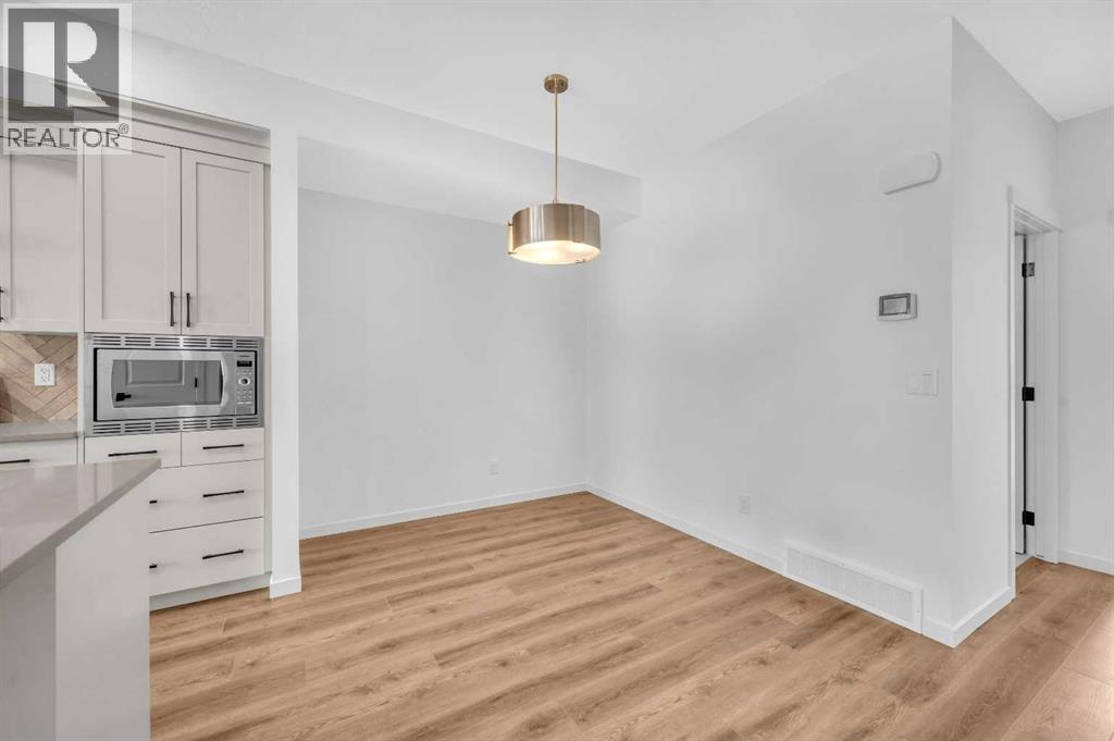 32 Rowmont Common Nw, Calgary, Alberta  T3L 0L3 - Photo 10 - A2233479