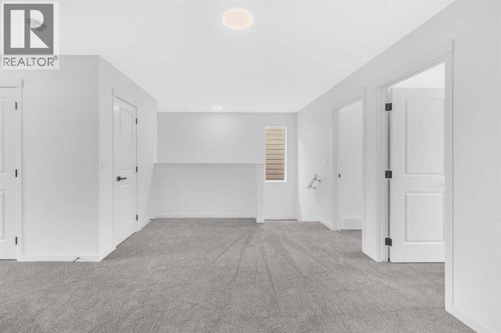 32 Rowmont Common Nw, Calgary, Alberta  T3L 0L3 - Photo 27 - A2233479