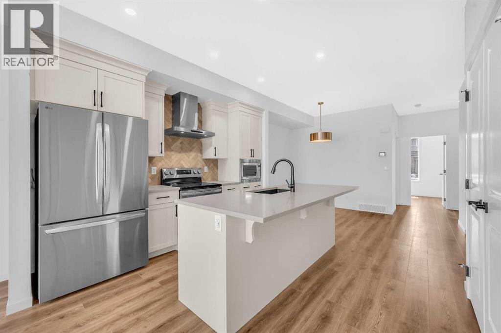 32 Rowmont Common Nw, Calgary, Alberta  T3L 0L3 - Photo 13 - A2233479